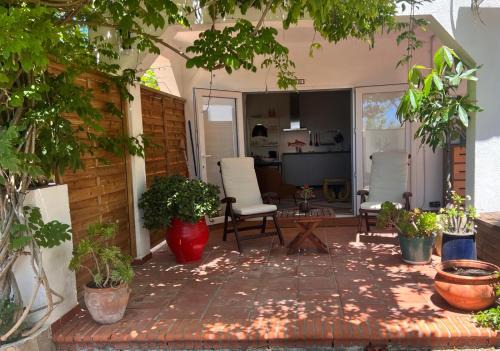 Conil de la Frontera Apartment | Abajo Stijlvol appartement met zwembad en tuin