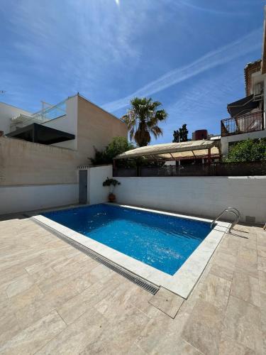 Zaidin Apartment | Alquibla relax y armonía con piscina junto a restaurantes y supermercados