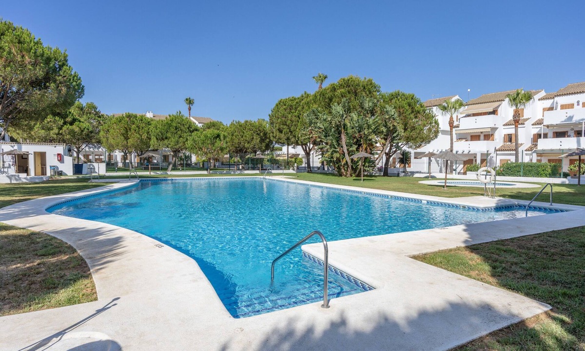 Poblado Sancti Petri Apartment | Apartment 'Brisa De La Barrosa' with Shared Pool, Private Terrace and Air Conditioning