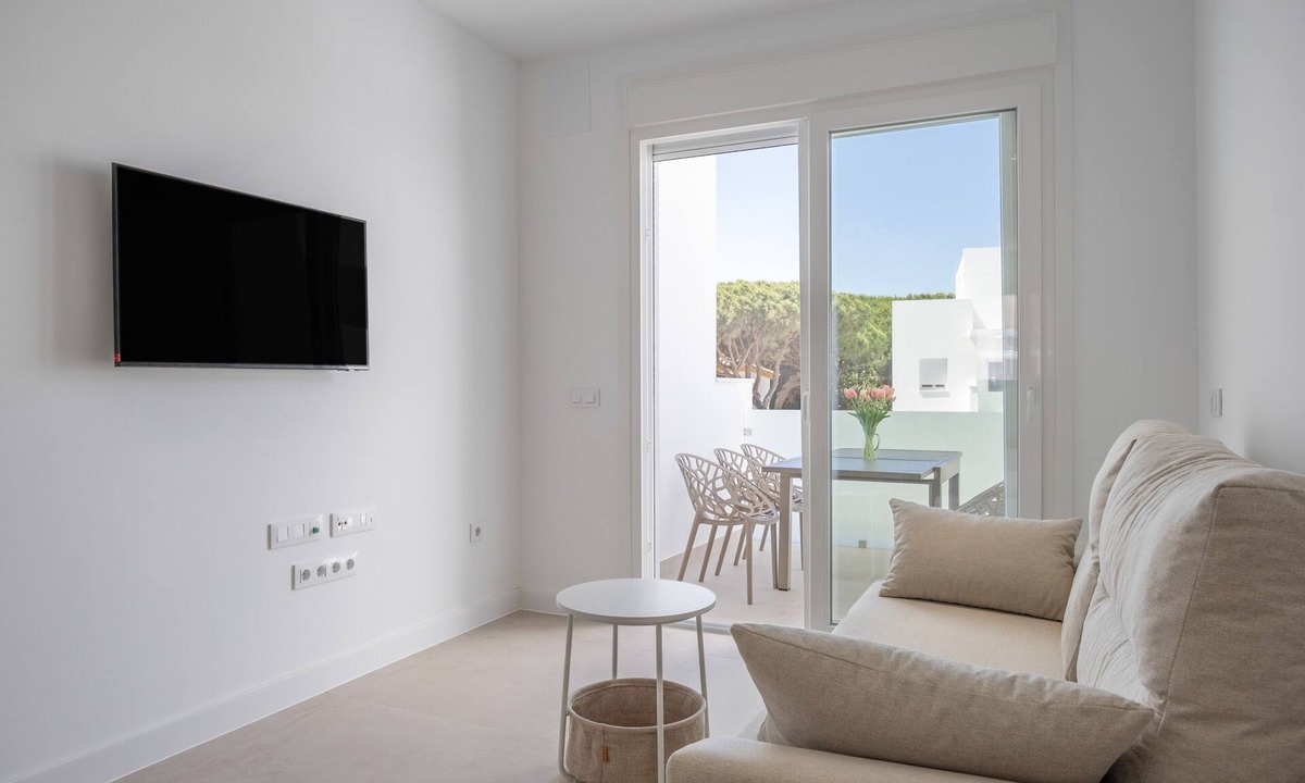 Poblado Sancti Petri Apartment | Apartment 'Los Drogos, Building A, First A' with Shared Pool, Garden and Wi-Fi