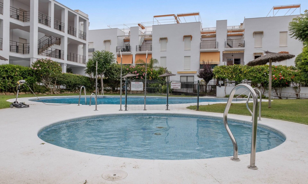 Chipiona Apartment | Apartment 'Golf Y Costa' with Shared Pool, Wi-Fi and Air Conditioning