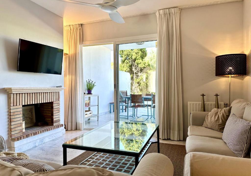 Guadalmina Apartment | Blue House in Guadalmina Baja, with a large terrace overlooking the Golf