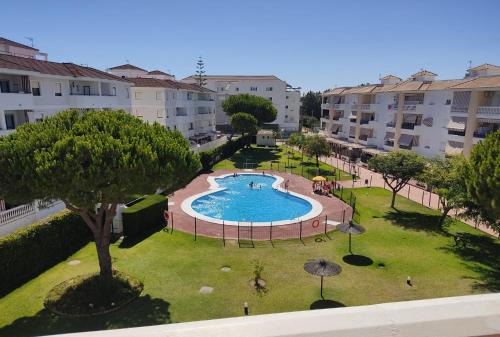 El Portil Apartment | Bonito piso con piscina y pádel
