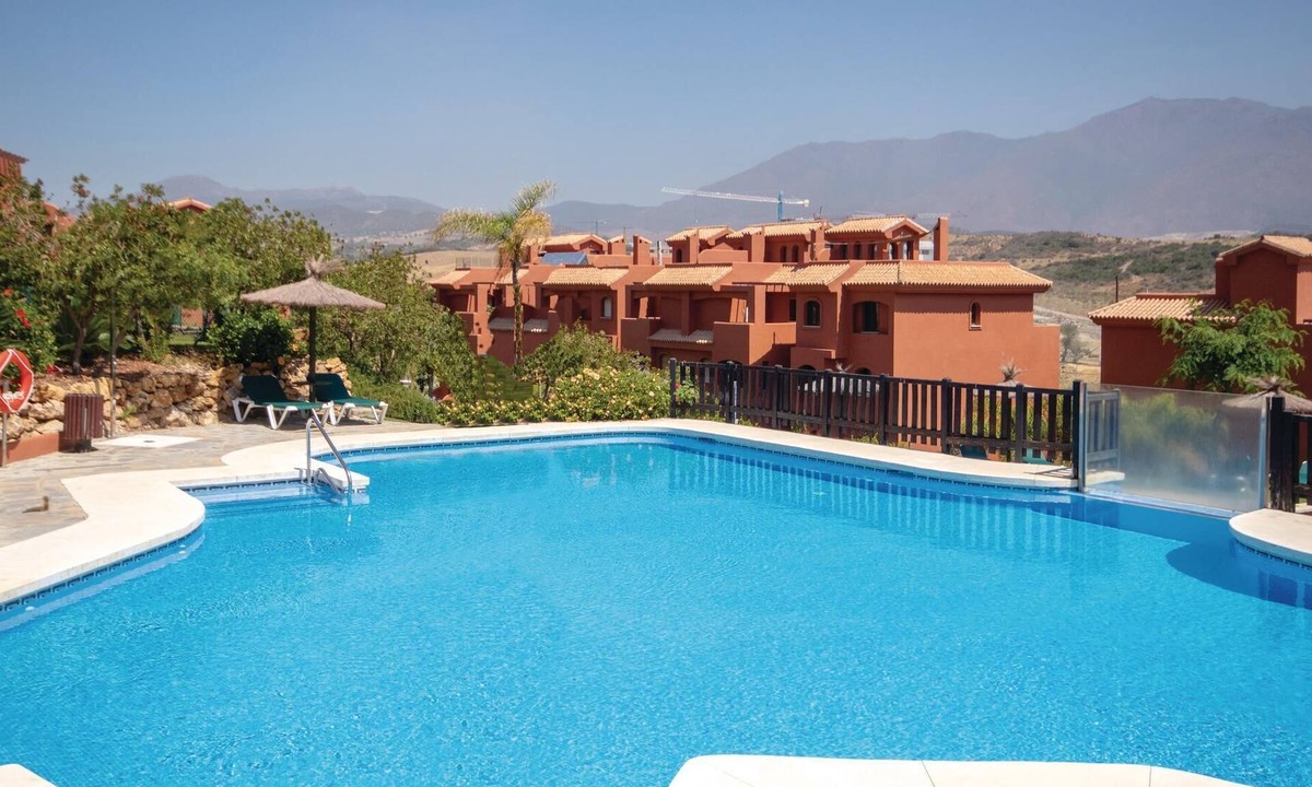Buenas Noches Apartment | Bright, comfortable apartment with shared pool and close to the sandy beach.