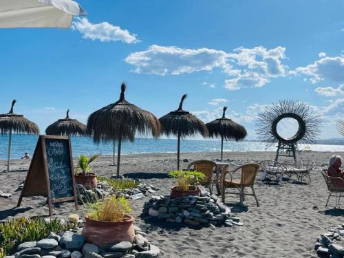 Mezquitilla Apartment | Casa Mariposa: 2BR Apt with Pool Steps from Beach