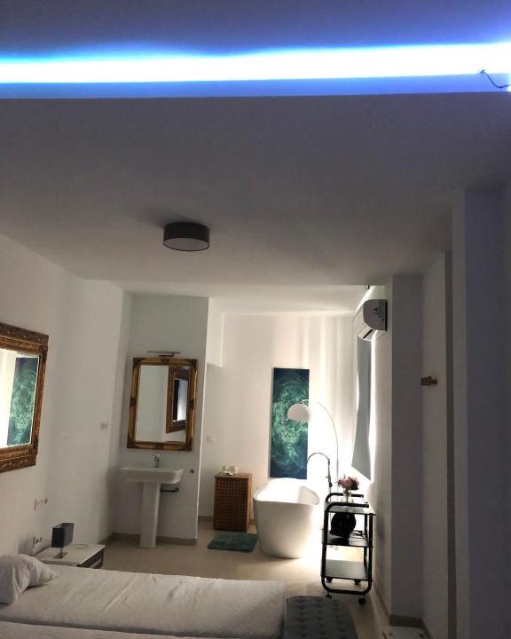 La Cala del Moral Villa | Cheerful five bedroom villa with a hot tub &cinema