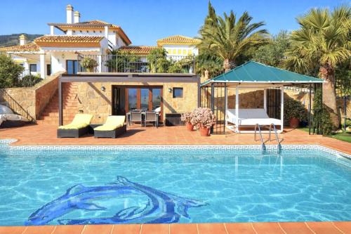 Antequera Villa | Family-friendly villa with pool & padel court near El Torcal de Antequera