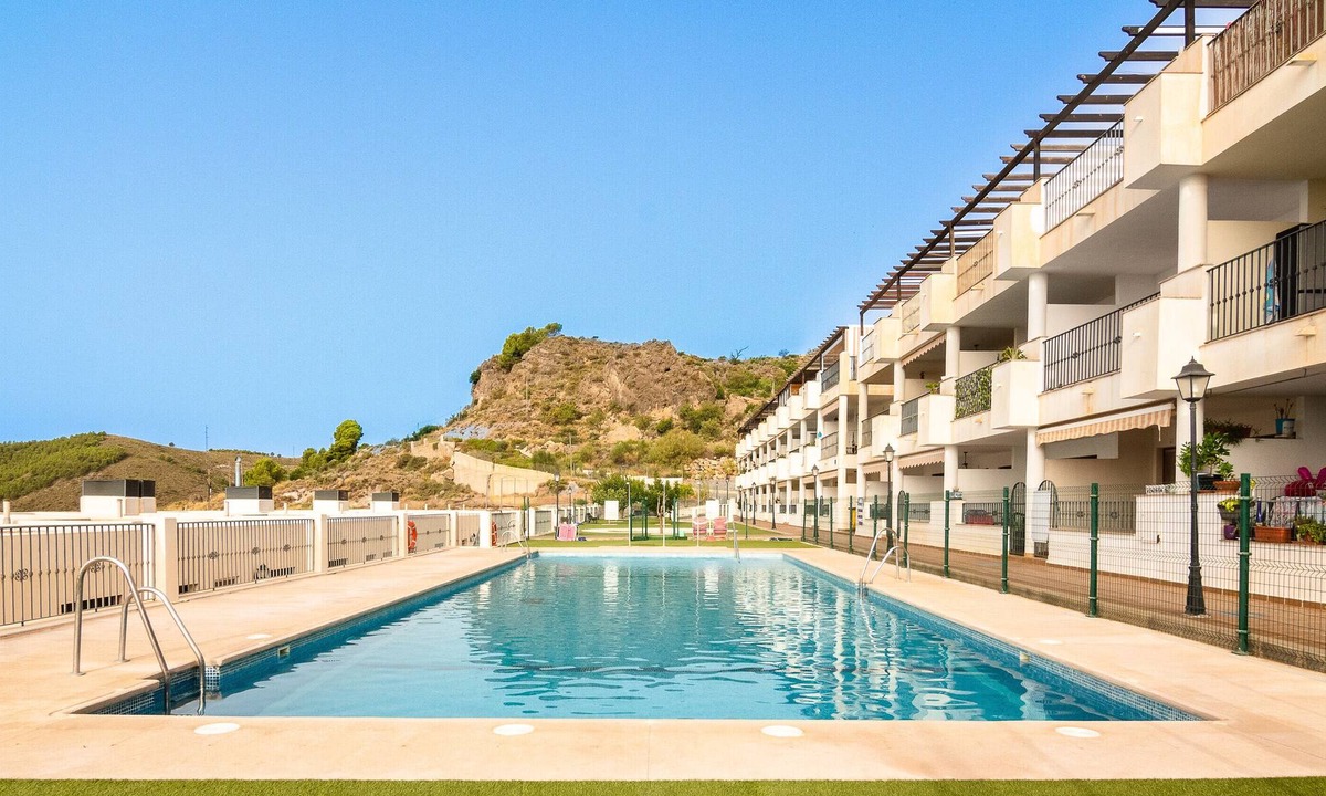 Enix Apartment | Holiday Apartment "Oasis En Enix" with Sea View, Shared Pool & Wi-Fi