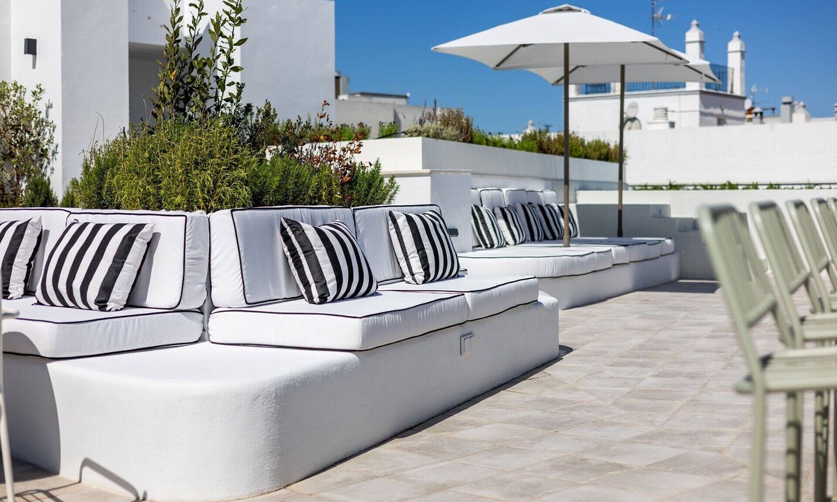 Chiclana de la Frontera Apartment | Holiday Apartment "Suite Con Balcón 1" with 2 Balconies, Shared Terrace & Wi-Fi