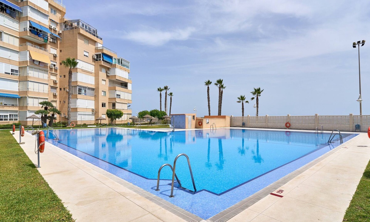 Mezquitilla Apartment | Holiday Home 'Algarrobo Costa Studio Sun-sat' with Shared Pool, Shared Garden and Air Conditioning