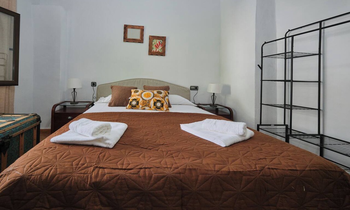 Arenas del Rey Bed & Breakfast | Luxury bedroom at Los Retamales with a queen-size bed, Casa Mathilda