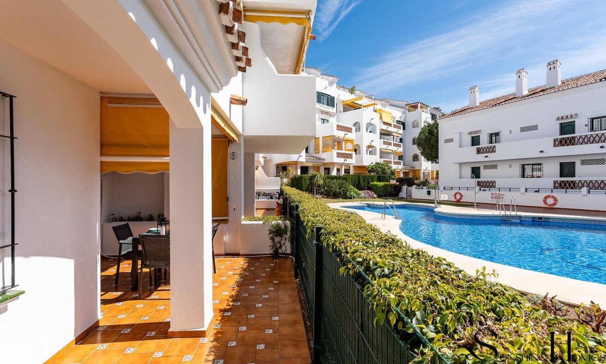 Benalmadena Costa Apartment | Poolside 2 bedroom apartment sunny retreat REF052