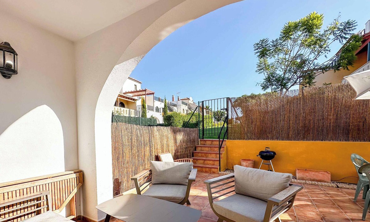 Costa Esuri Ski Chalet | ROU002 Townhouse with Private Garden and Direct Access to the Pool