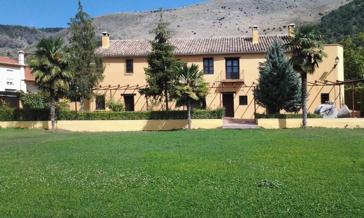 Alfacar House | Rustic and cozy room with private bathroom, double bed and garden view.