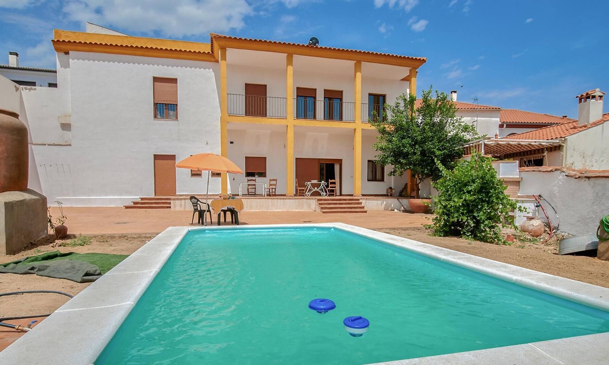 Villanueva del Rey House | Spacious vacation home with private outdoor pool.