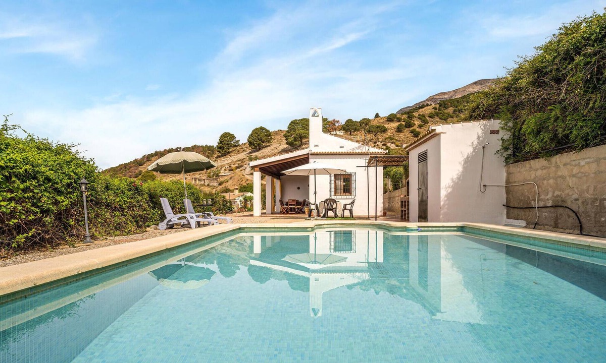 Sedella House | Spend the vacation in this inviting cottage in a beautiful location.