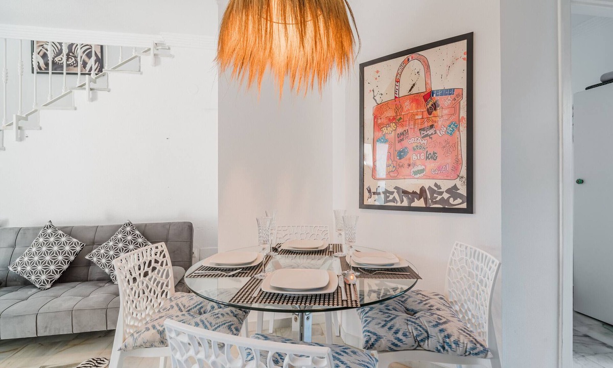 Urbanizacion Hacienda las Chapas Ski Chalet | Sunny Marbella Townhouse with Terraces, Pool & Hotel Amenities