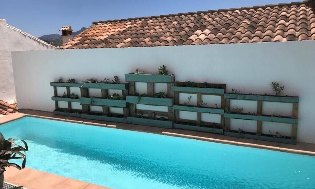 Algodonales House | Two big houses with pool nestled into foot of the mountain