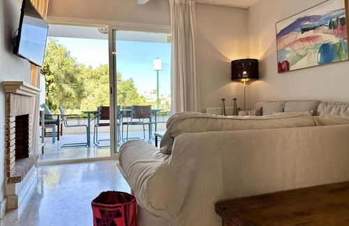 Guadalmina Apartment | Blue House in Guadalmina Baja, with a large terrace overlooking the Golf