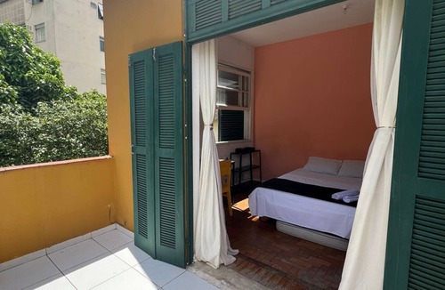 Laranjeiras House | A suíte in fabulous Laranjeiras Rio de Janeiro with Huge Balcony and Mountain