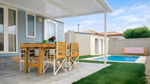 El Palmar House | Acogedora casa familiar a pasos de la playa piscina y wifi