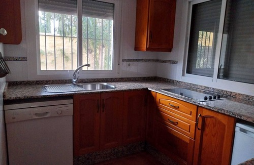 Campano Ski Chalet | Andalusian style houses (12p) with large swimming pool in subtropical garden