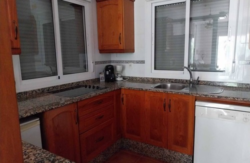 Campano Ski Chalet | Andalusian style houses (12p) with large swimming pool in subtropical garden
