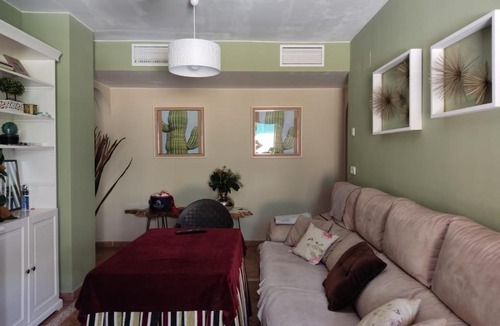 Costa Esuri Apartment | Apartamento completo con piscina comunitaria y patio exterior