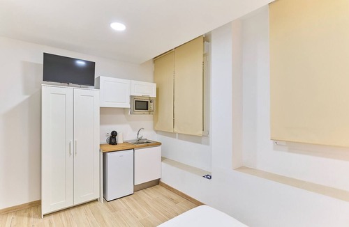 Puente de Vallecas Apartment | Apartamentos Méndez Álvaro by gaiarooms