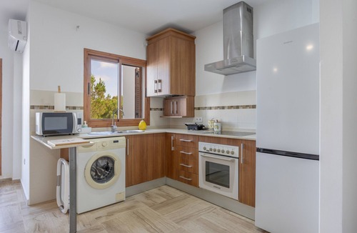 Poblado Sancti Petri Apartment | Apartment 'Brisa De La Barrosa' with Shared Pool, Private Terrace and Air Conditioning