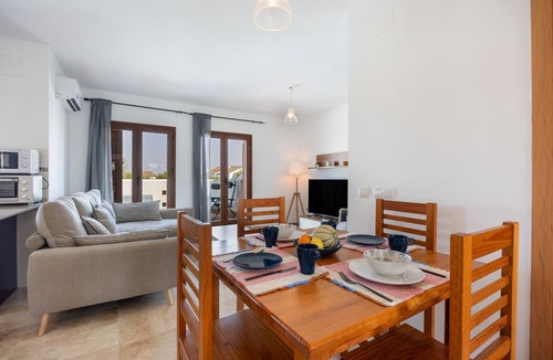 Poblado de Sancti Petri Apartment | Apartment 'Viento Del Mar' with Shared Pool, Private Terrace and Air Conditioning.