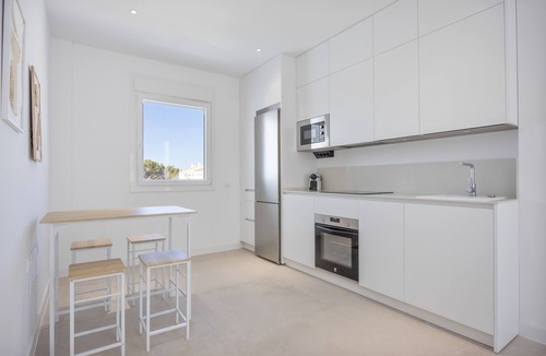 Poblado Sancti Petri Apartment | Apartment 'Los Drogos, Building A, Penthouse A' with shared pool, garden and Wi-Fi