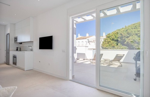 Poblado Sancti Petri Apartment | Apartment 'Los Drogos, Building A, Penthouse A' with shared pool, garden and Wi-Fi