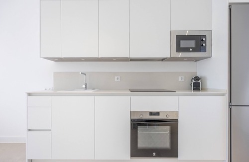 Poblado Sancti Petri Apartment | Apartment 'Los Drogos, Building A, First A' with Shared Pool, Garden and Wi-Fi