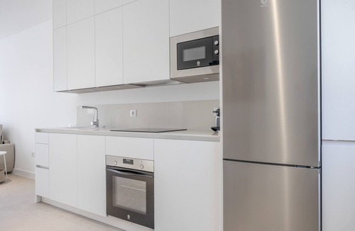 Poblado Sancti Petri Apartment | Apartment 'Los Drogos, Building A, First A' with Shared Pool, Garden and Wi-Fi
