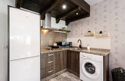 Teatinos Apartment | Apartment 'Apartamento Mefistofeles' with Private Terrace, Wi-Fi & Air Conditioning