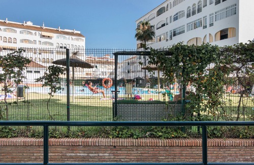 El Portil Apartment | Apartment 'El Portil' with Shared Pool, Wi-Fi and Air Conditioning