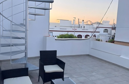 Sanlucar de Barrameda Apartment | Apartment 'Bajo De Guía 1A' with Private Terrace, Wi-Fi and Air Conditioning