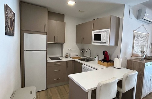 Puente Genil Apartment | Apartment in A Hotel 'Apartamento Type 2 A' with Private Terrace, Wi-Fi and Air Conditioning