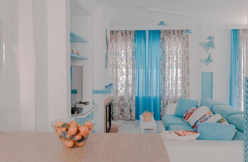 La Cala del Moral House | Apartment 'Melina' with Sea View, Wi-Fi and Air Conditioning