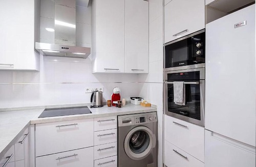 Santiago Apartment | Art in El Limonar de la Ribera Parking