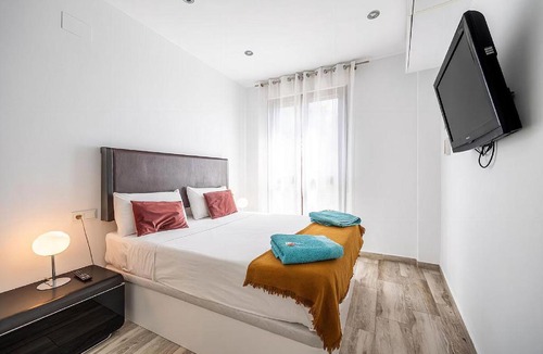 Santiago Apartment | Art in El Limonar de la Ribera Parking