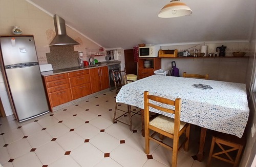 Noja House | Attic with an enclosed garden, perfect for children.