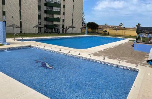 Valdelagrana Apartment | Azvalia - Valparaíso beach apartment - Piscina y parking gratis