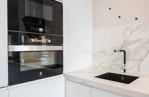 La Malagueta Apartment | Beachfront 2BR Apartment in Central Malaga with Terrace and Modern Amenities