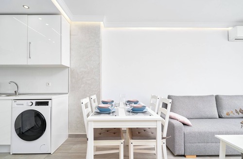 Caleta de Velez Apartment | Beachside Bliss Apartment with Shared Pool, Wi-Fi, and Air Conditioning