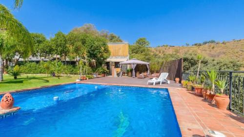 Guaro House | Casa Ana de Guaro by Ruralidays