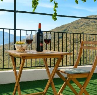 Abrucena House | Casa del Agua- Casa rural con encanto en Sierra Nevada terraza y chimenea