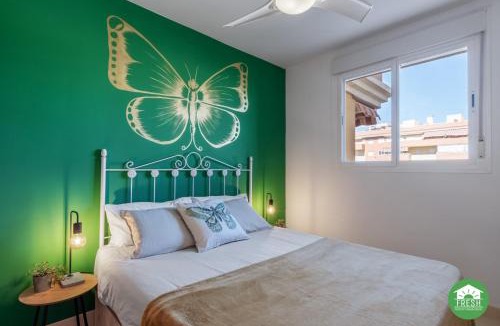 Mezquitilla Apartment | Casa Mariposa: 2BR Apt with Pool Steps from Beach