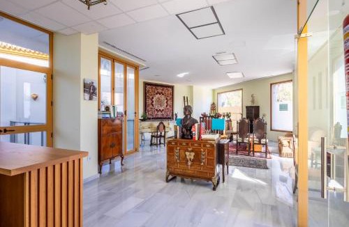Carmona House | Casa Xanadu Carmona - Stylish villa with rooftop terrace and stunning views of Parador